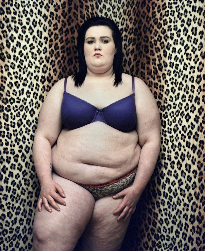 Abbie Trayler-Smith  Shannon, 16, poses in her bedroom for a 'before' picture on the night before she has surgery at Sheffield Childrens Hospital as part of a medical trial to recieve a gastric balloon.From the series The Big O, an intimate porttrait of the children behind the obesity statstics in the UK.  It is estimated that 1 in 3 children in the UK are now classified as obese or overweight.